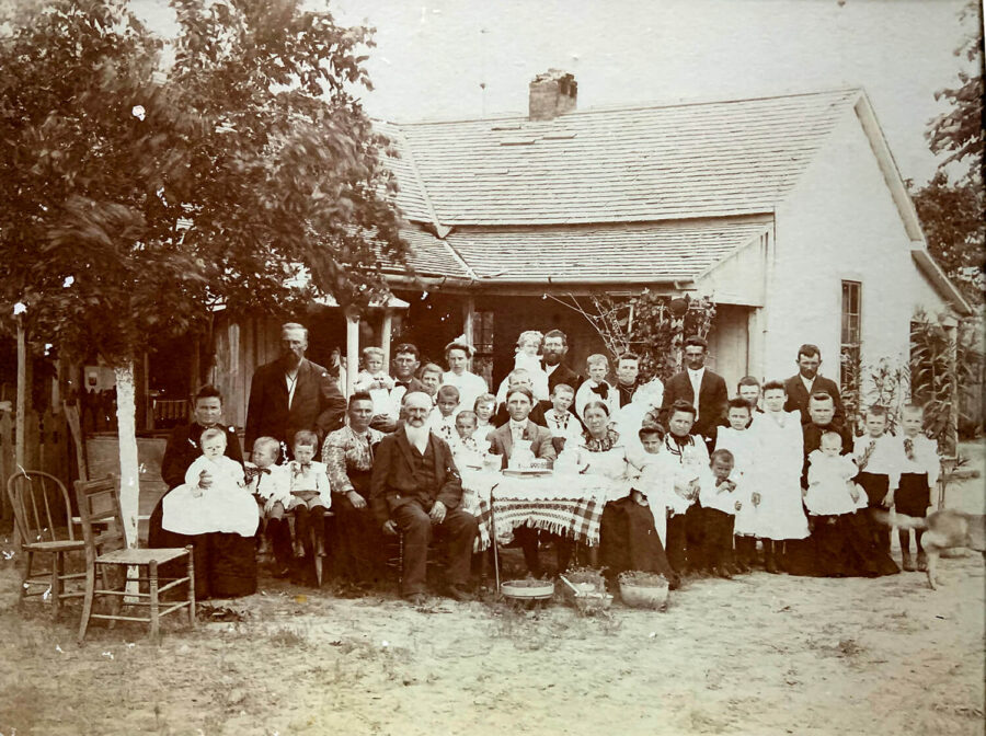 Joseph , Louisa, Clem (in Louisa’s lap), John, and Joe Jr. with Louisa’s siblings, their families and her parents (circ. 1904)